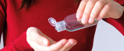 Applying Hand Sanitizer